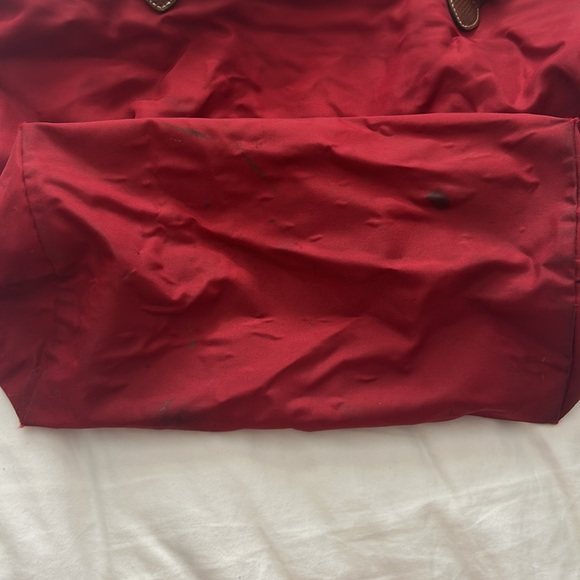 Longchamp Le Pliage Canvas Handbag - Red | Editorialist Longchamp Red Tote Bag with Brown Handles